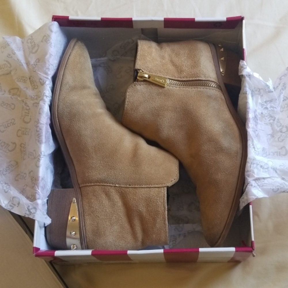 Leather low heel  booties with gold spikes on heel